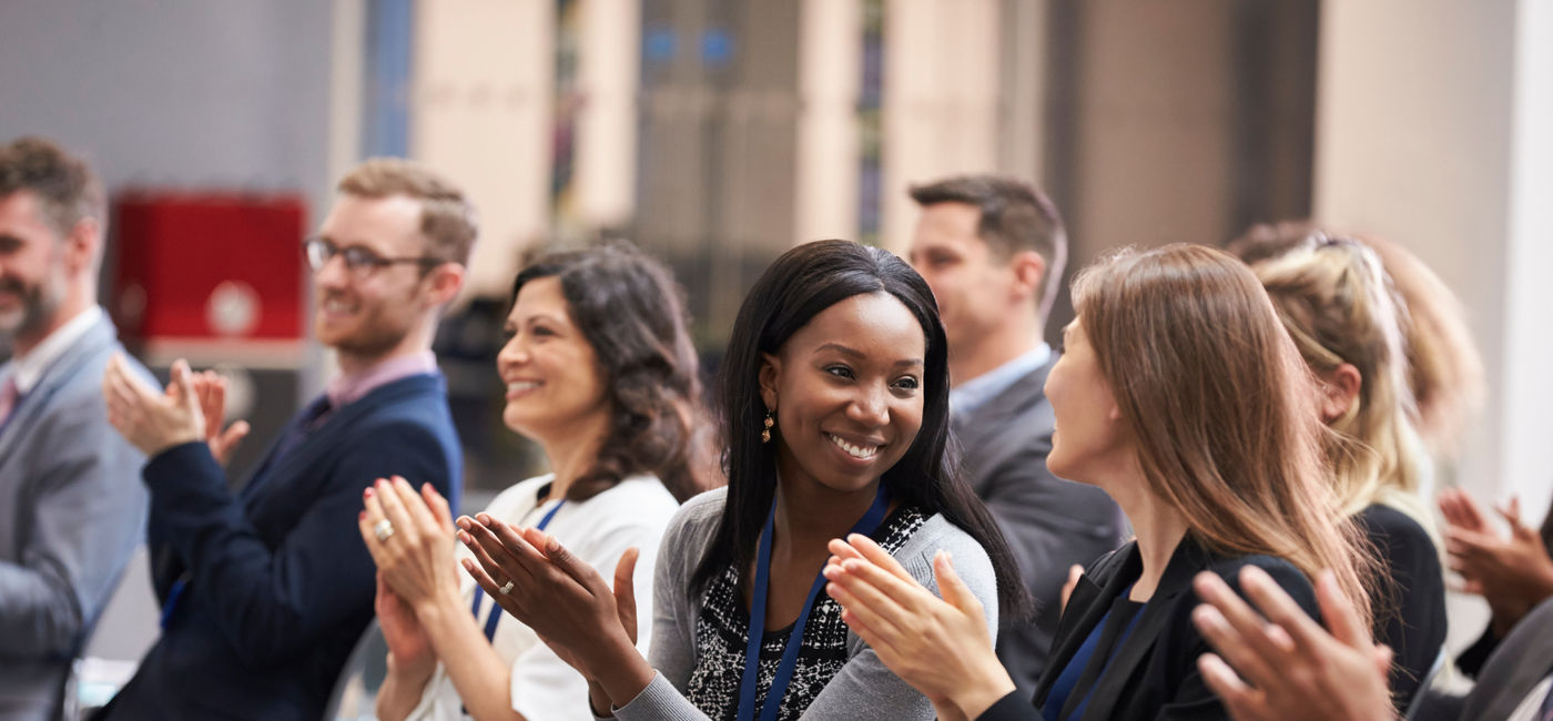 Image: Destination professionals gather at an industry event. (Photo Credit: Adobe Stock)