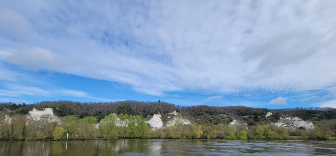 Limestone cliffs occasionally border the Seine in Normandy, France. Normandy, seine river cruising, river seine, france, lacey pfalz, cliffs, cliffs in france