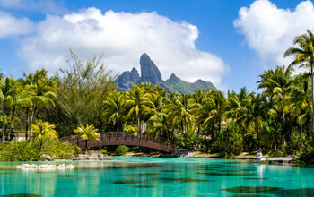 Lagoonarium with bridge and Mount Otemanu in distance