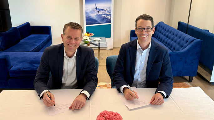 John Weatherill, WestJet EVP and CCO with Paul Verhagen, SAS EVP and CCO signing at the IATA AGM in Delhi, India John Weatherill, WestJet EVP and CCO with Paul Verhagen, SAS EVP and CCO signing at the IATA AGM in Delhi, India