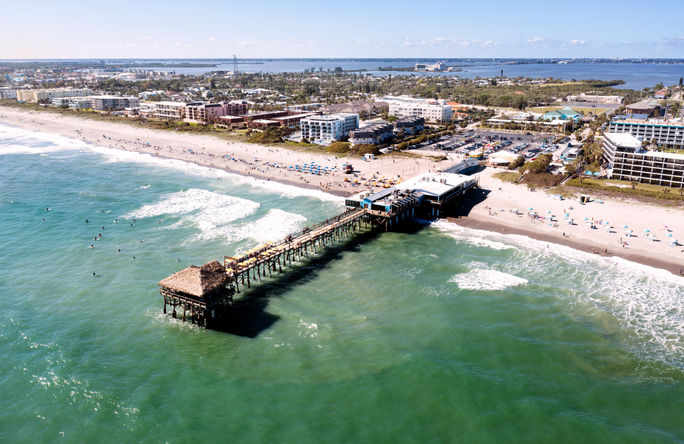Aerial view of the beach and pier in Cocoa Beach, Florida Aerial view of the beach and pier in Cocoa Beach, Florida