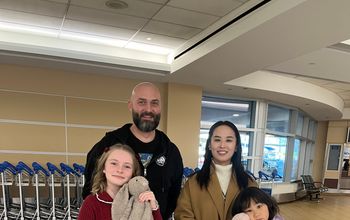 Joey Gibbs and his daughter meet the bunny’s young owner at YEG, a reunion arranged by WestJet.
