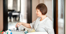 Housekeeping staff member working at a hotel. 