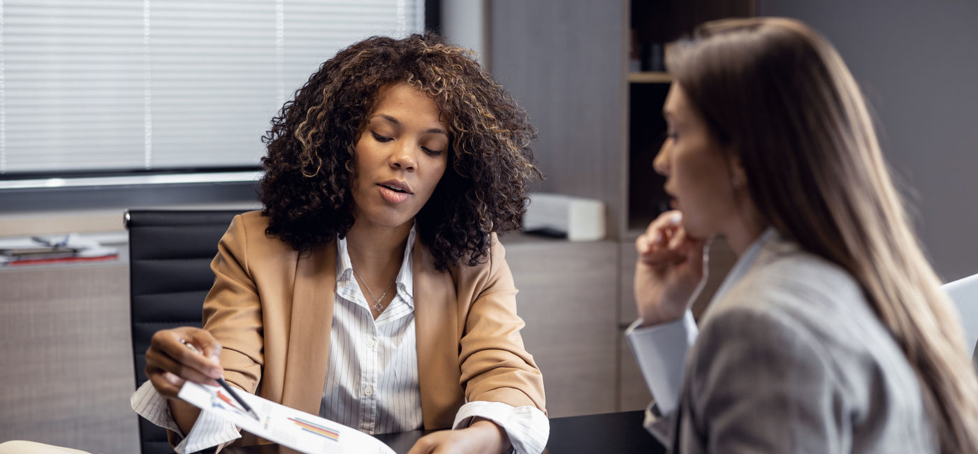 Image: Travel advisor working with client. (Photo Credit: Courtesy AdobeStock)
