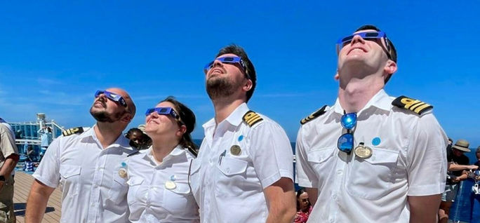 Princess Cruises officers view the solar eclipse. Princess Cruises, princess cruises officers, cruise officers, solar eclipse, solar eclipse travel, astrotourism, solar eclipse cruises