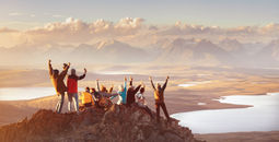 Large group of friends in mountains area.