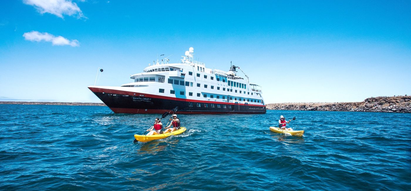 Image: Guests kayaking from the MS Santa Cruz II. (photo via Hurtigruten Expeditions) (Photo Credit: (photo via Hurtigruten Expeditions))