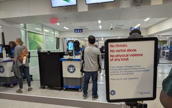 Airport, TSA warning sign, security line,