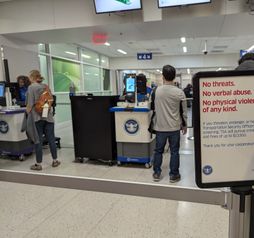 Airport, TSA warning sign, security line,