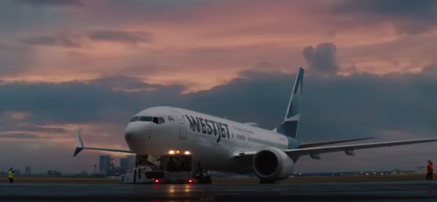 Image: WestJet wants the federal government to make flying more affordable. (Photo Credit: WestJet)