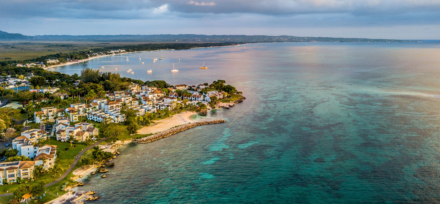 Image: An aerial view of the beach in Negril, Jamaica (Photo Credit: Adobe Stock)
