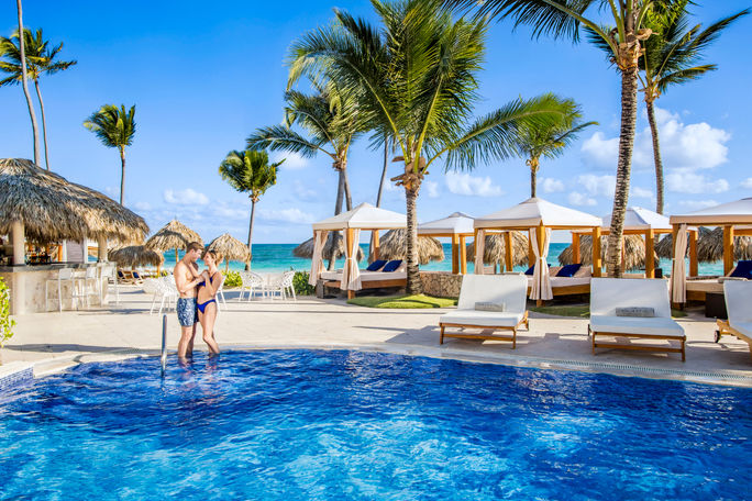 A couple enjoying the resort. A couple enjoying the resort.