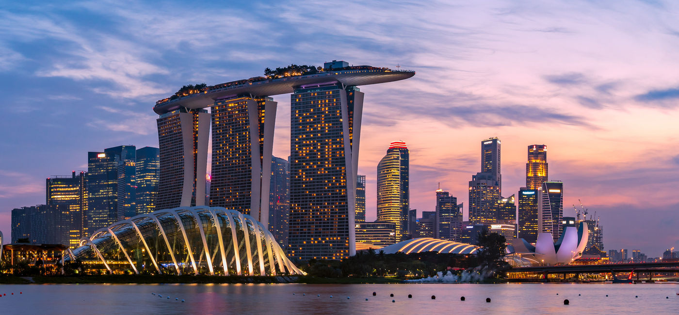Image: Singapore Marina Bay area and CBD district at dusk. (Photo Credit: Adobe Stock/hit1912)