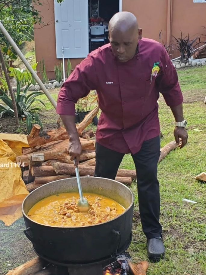 Chef Andre cooking Curry Goat in Grenada