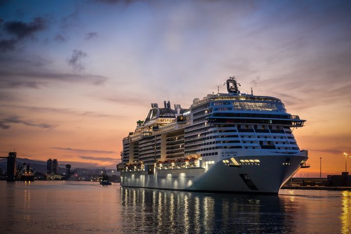 MSC Grandiosa departed from Barcelona.