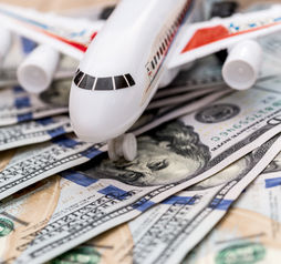 Airplane on dollar bills.