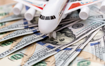 Airplane on dollar bills.