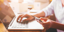 PHOTO: Entrepreneurs women hands holding credit card (photo via Natnan Srisuwan / iStock / Getty Images Plus)