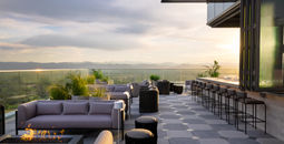 The 19-story hotel has a rooftop bar with views of the Rockies