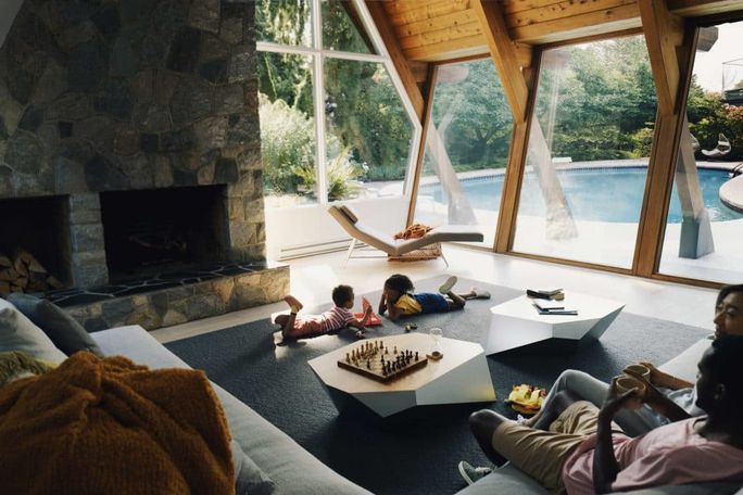 Children playing board game inside Vrbo rental