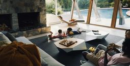 Children playing board game inside Vrbo rental