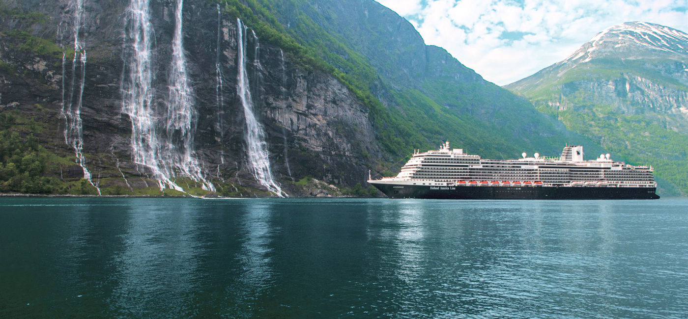 Image: Holland America Line’s Koningsdam in Geiranger, Norway. (Photo Credit: Holland America Line)