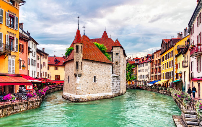 The Palais de I’Ile is a 12th-century building that sits on the Thiou River in Annecy’s old town.