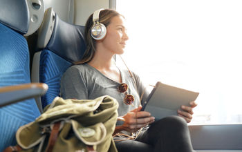 Woman traveling by train