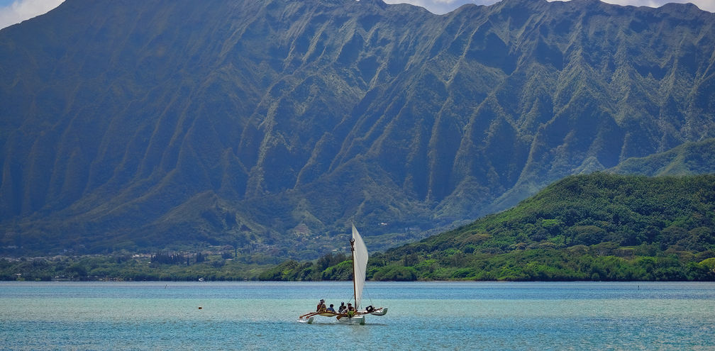 Outrigger canoe sailing in Kaneohe Bay, Oahu, Hawaii.