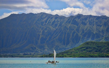Outrigger canoe sailing in Kaneohe Bay, Oahu, Hawaii.