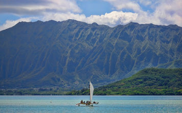 Outrigger canoe sailing in Kaneohe Bay, Oahu, Hawaii.
