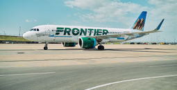 Frontier Airlines plane at the airport.