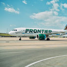Frontier Airlines plane at the airport.