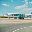 Frontier Airlines plane at the airport.