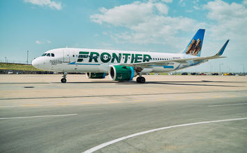 Frontier Airlines plane at the airport.