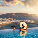 Luxury travel, luxury travelers, infinity pool, wine, Mykonos, Greece