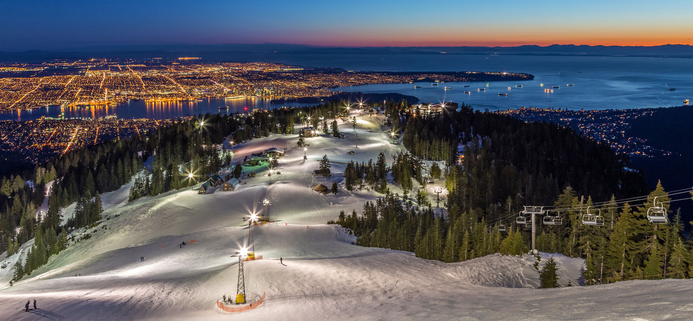 Image: Grouse Mountain ski resort with a view of Vancouver (Photo Credit: peteleclerc/Adobe Stock)