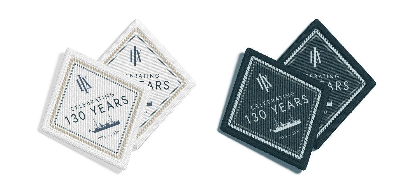 Image: HX's 130-year anniversary badges will be given to HX Explorers members who travel in 2026. (Photo Credit: HX)