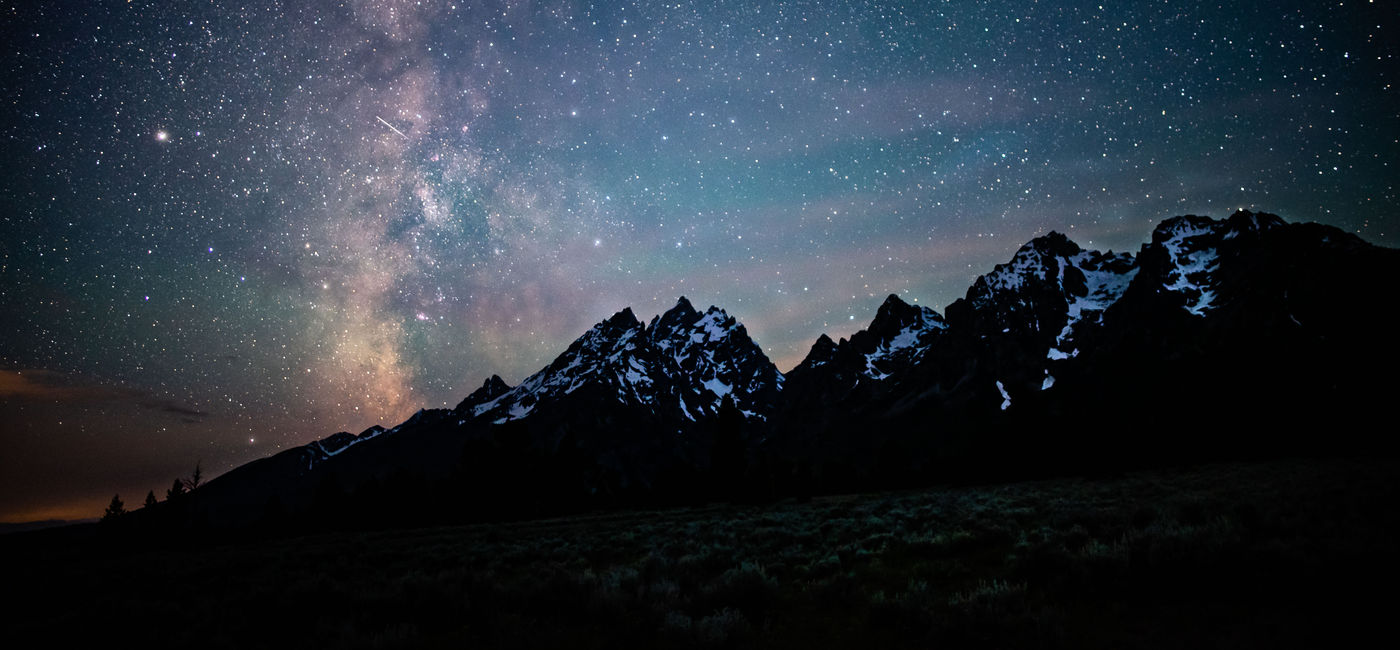 Image: Grand Teton Mountains Silhouetted by the Milky Way (Photo Credit: Courtesy AdobeStock)