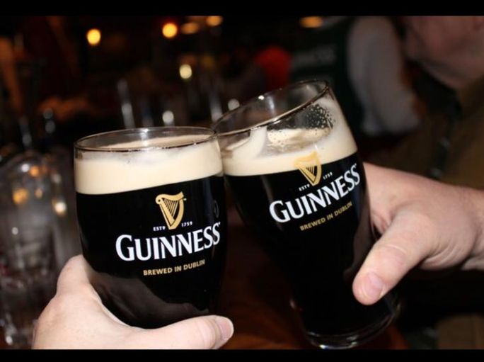 People enjoying Guinness at Mullaney's Harp and Fiddle Mullaney's Harp and Fiddle, Irish Pub