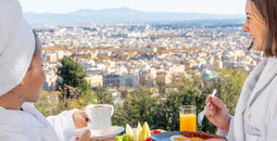Guests enjoying breakfast at Rome Cavalieri, A Waldorf Astoria Hotel in Rome, Italy.