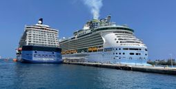 Celebrity Reflection (left) and Freedom of the Seas (right) and docked together at Nassau, Bahamas