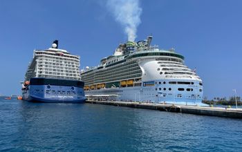 Celebrity Reflection (left) and Freedom of the Seas (right) and docked together at Nassau, Bahamas