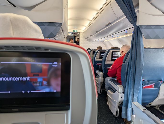 Delta cabin interior Delta cabin interior, plane, seat, screen, seatback, screens, entertainment