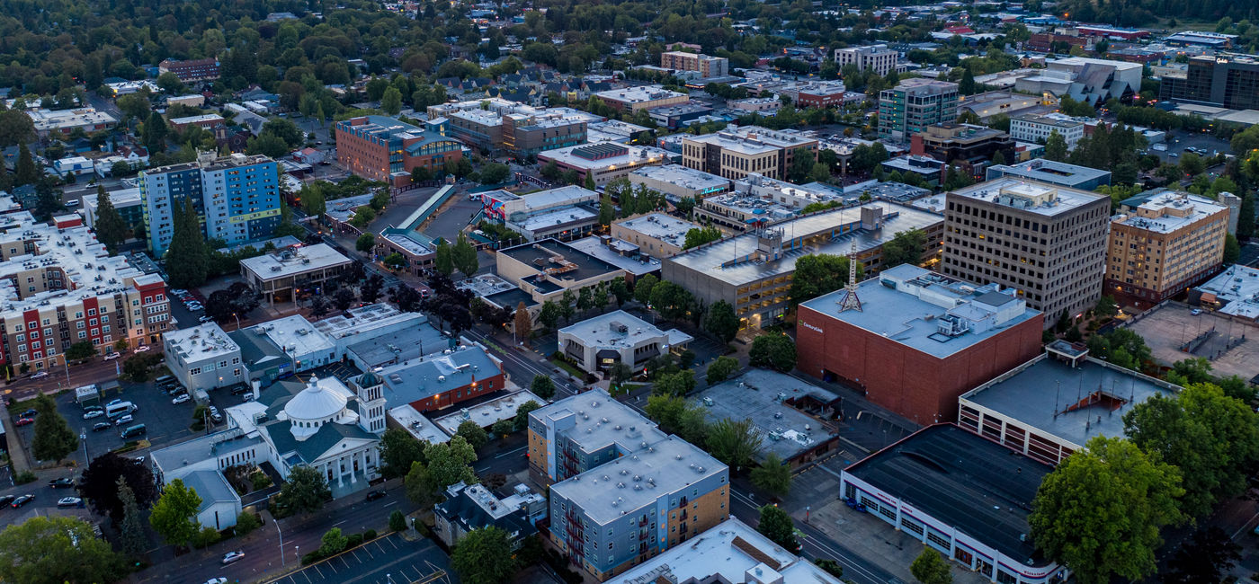 Image: Aerial view of Eugene, Oregon. (Photo Credit: Reagan/Adobe)