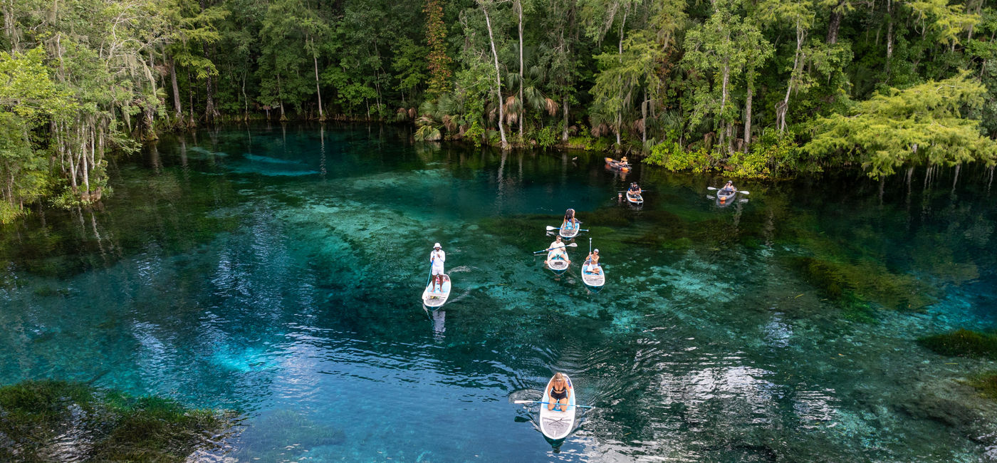 Image: Paddle-boarding on the crystal-clear Silver Springs in northern Florida. (Photo Credit: Ocala/Marion County Visitors and Convention Bureau)