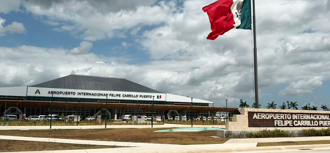 Image: Entrance to Tulum International Airport in Mexico. (Photo Credit: Photo by Paul J. Heney.)