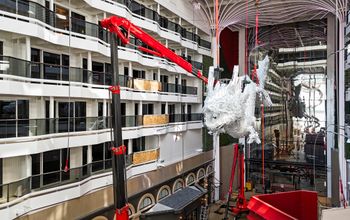 The dragon sculpture being installed aboard MSC World Asia