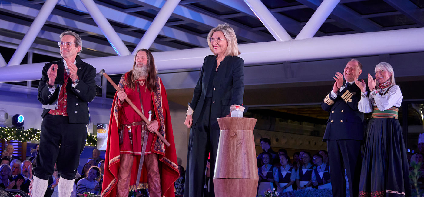 Image: Pictured here, godmother of the Viking Vela, Ivana Elice pressed a button at the naming ceremony that allowed a bottle of Norwegian aquavit to break on the ship’s hull. (Photo Credit: Viking)