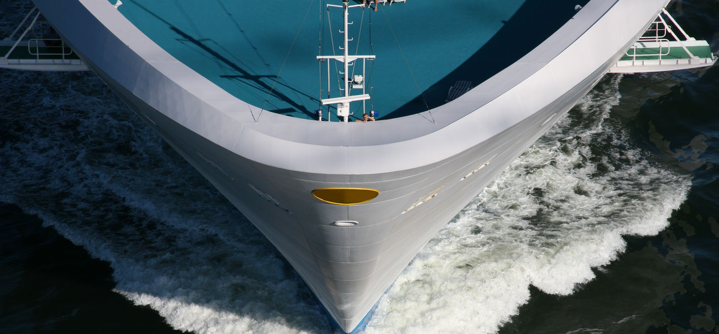 Image: Bow of cruise ship in ocean. (photo via zennie / E+)